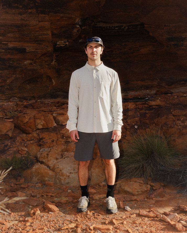 Hiker standing in a sandstone cave at Kings Canyon in the Beachwood Daylight™ Technical Long Sleeve Shirt