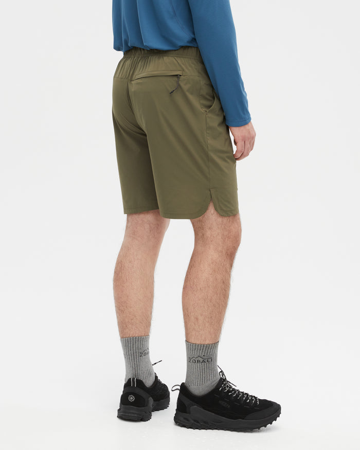 Kelly wearing the Ivy Green shorts, size M