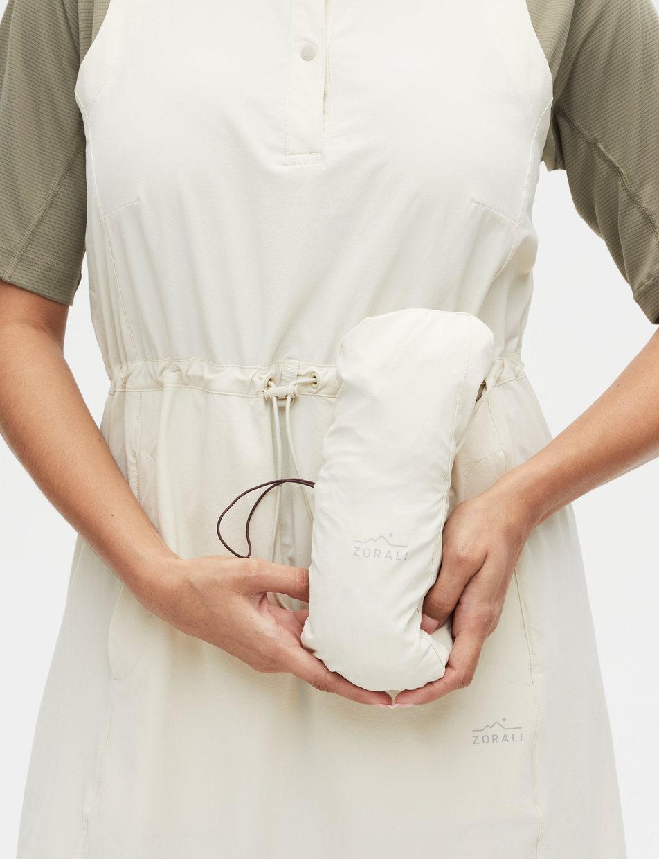 The Daylight™ Motion Dress packed into its own pocket (shown in Beachwood)