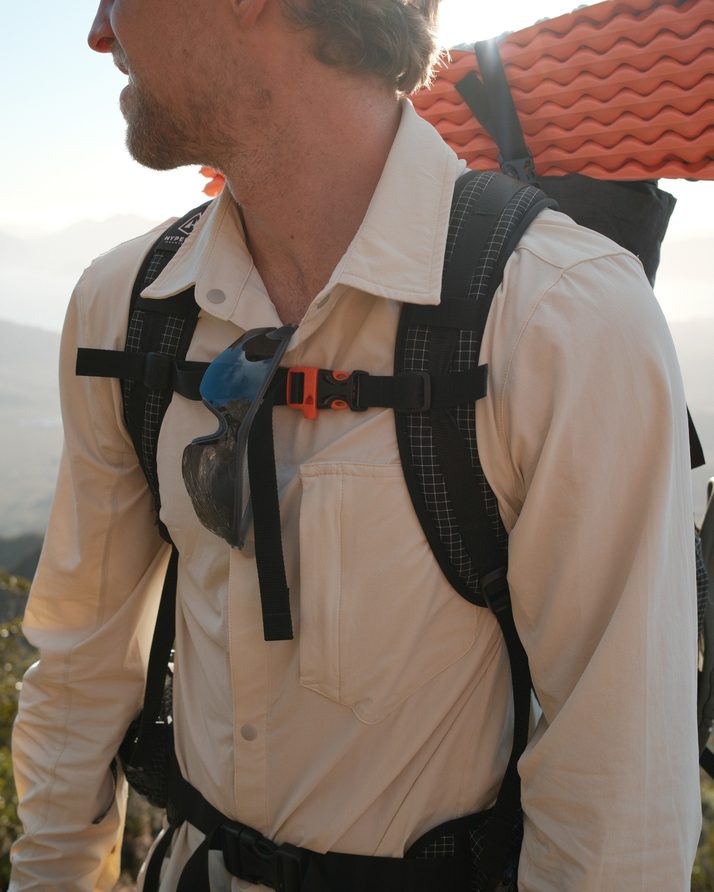Chest and placket of the Beachwood Daylight™ shirt under a pack harness