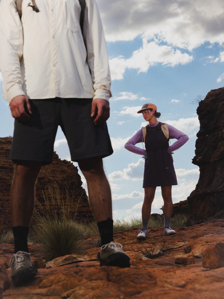 Hiker in Daylight™ Shorts in Ash with a friend in the Daylight™ Motion Dress in a red rock gorge