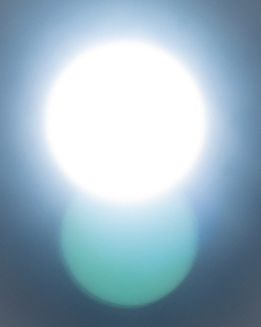 The sun, bright in a clear sky