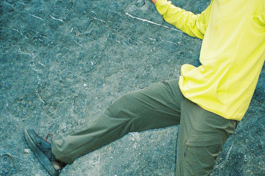 Overland Pant in Forest Night, stepping onto granite