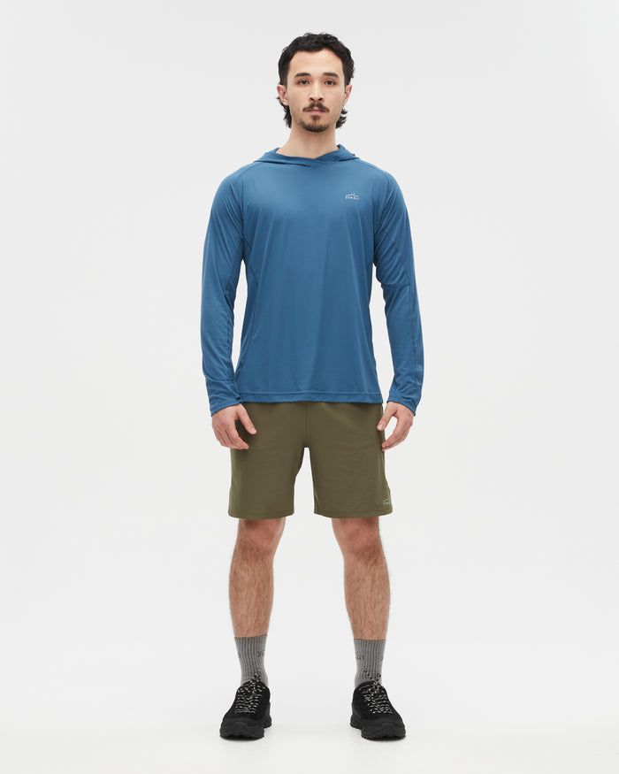Kelly wearing the Tasman Blue top, size L