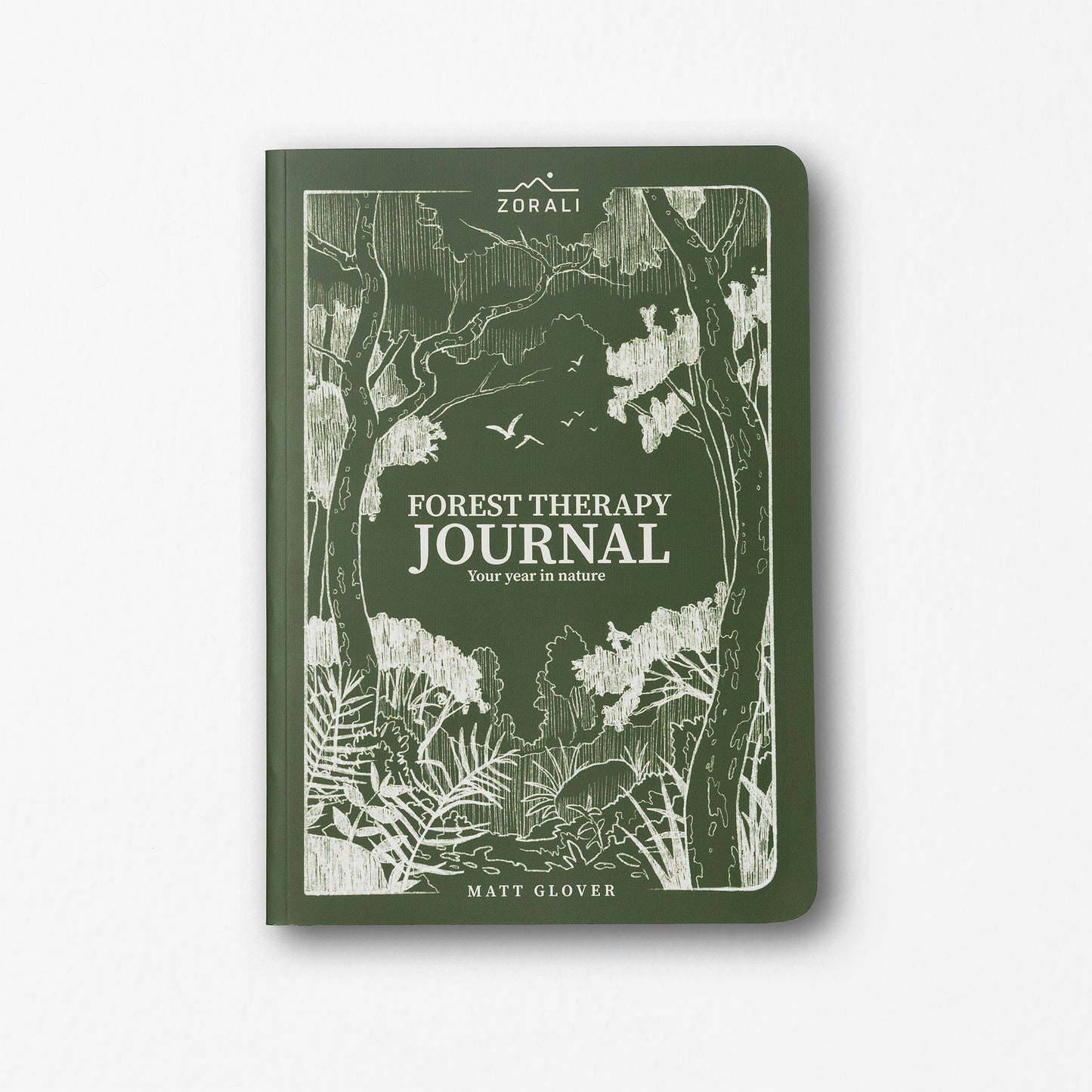 Green journal with forest design and 'Forest Therapy Journal' text on a white background