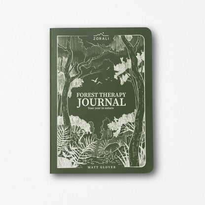 Green journal with forest design and 'Forest Therapy Journal' text on a white background