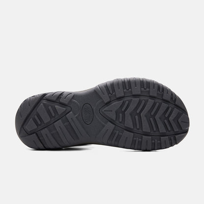 Black shoe sole on a light gray background