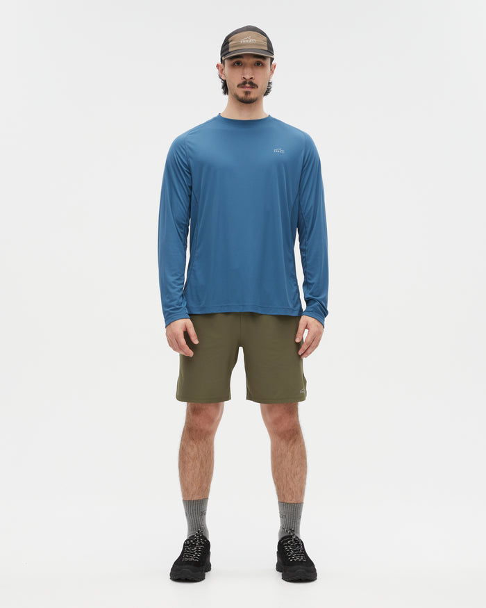 Kelly wearing the Ivy Green shorts, size M