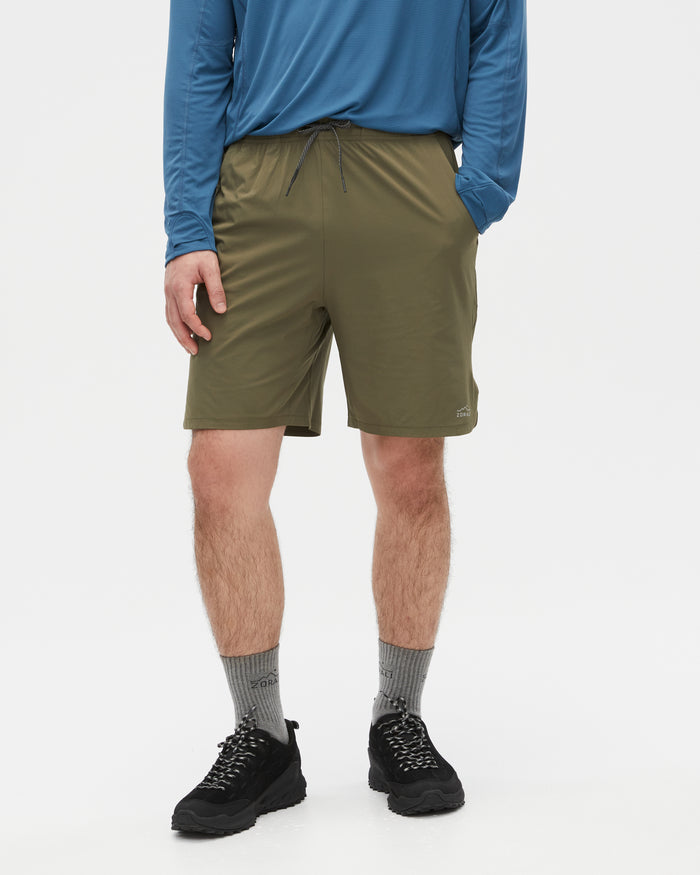Kelly wearing the Ivy Green shorts, size M
