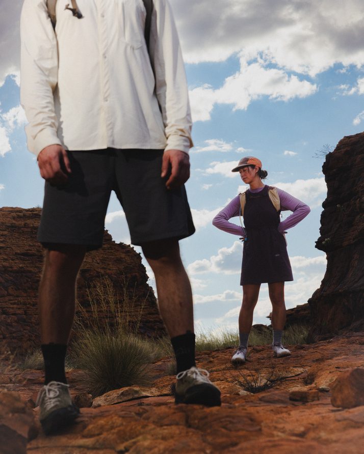 Hiker with hands on hips in a red rock gorge in the Daylight™ Motion Dress