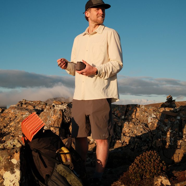Cam at a summit stop in Daylight™ Shorts in Ash