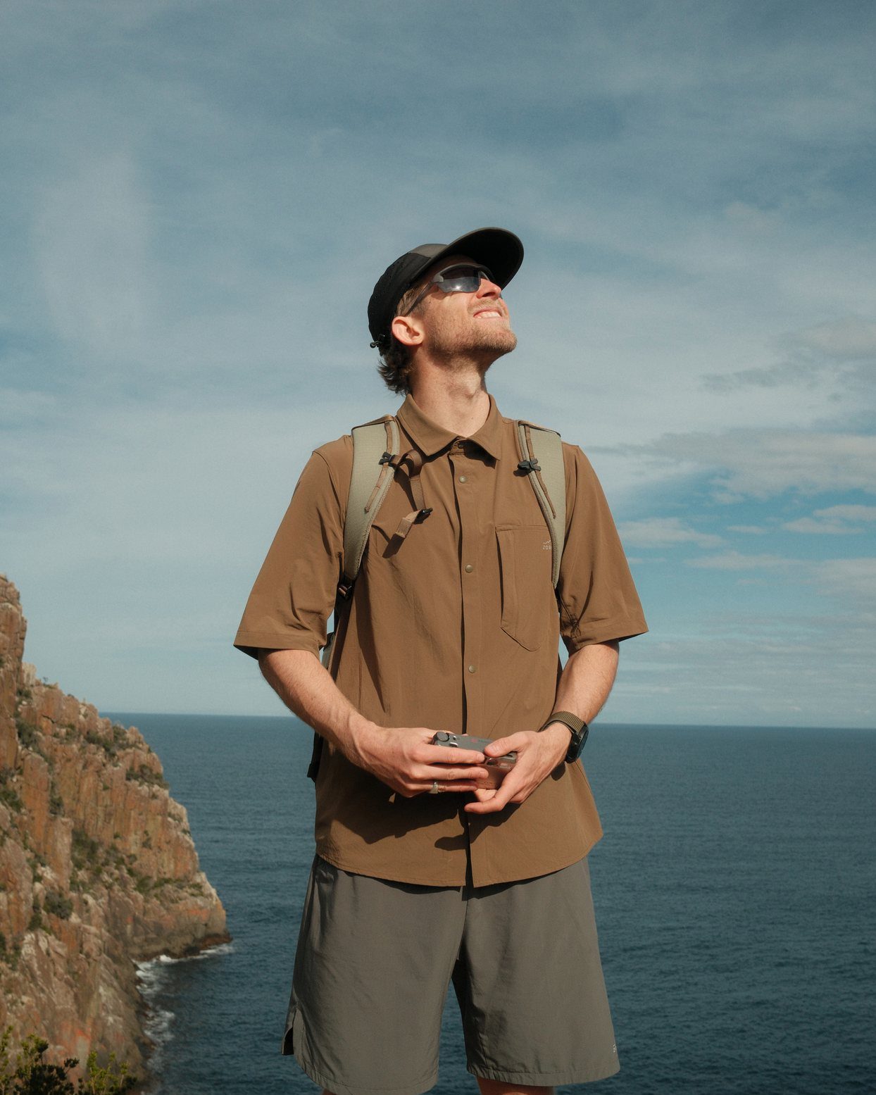 Cam on the Three Capes sea cliffs in the Teak Daylight™ Technical Short Sleeve Shirt